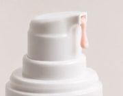 SÖMA RESTORE Recovery Serum texture. Lightweight pink serum designed for post-studio skincare and women in motion